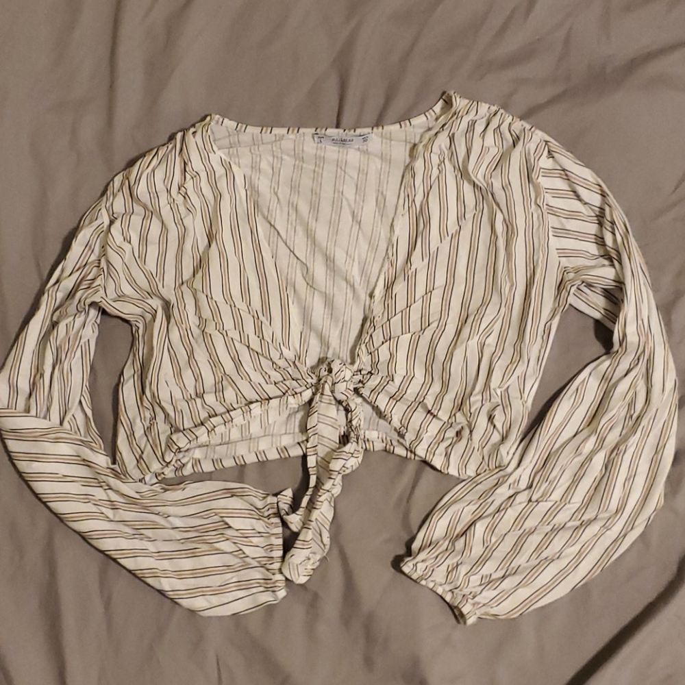 Open front tie long sleeve.